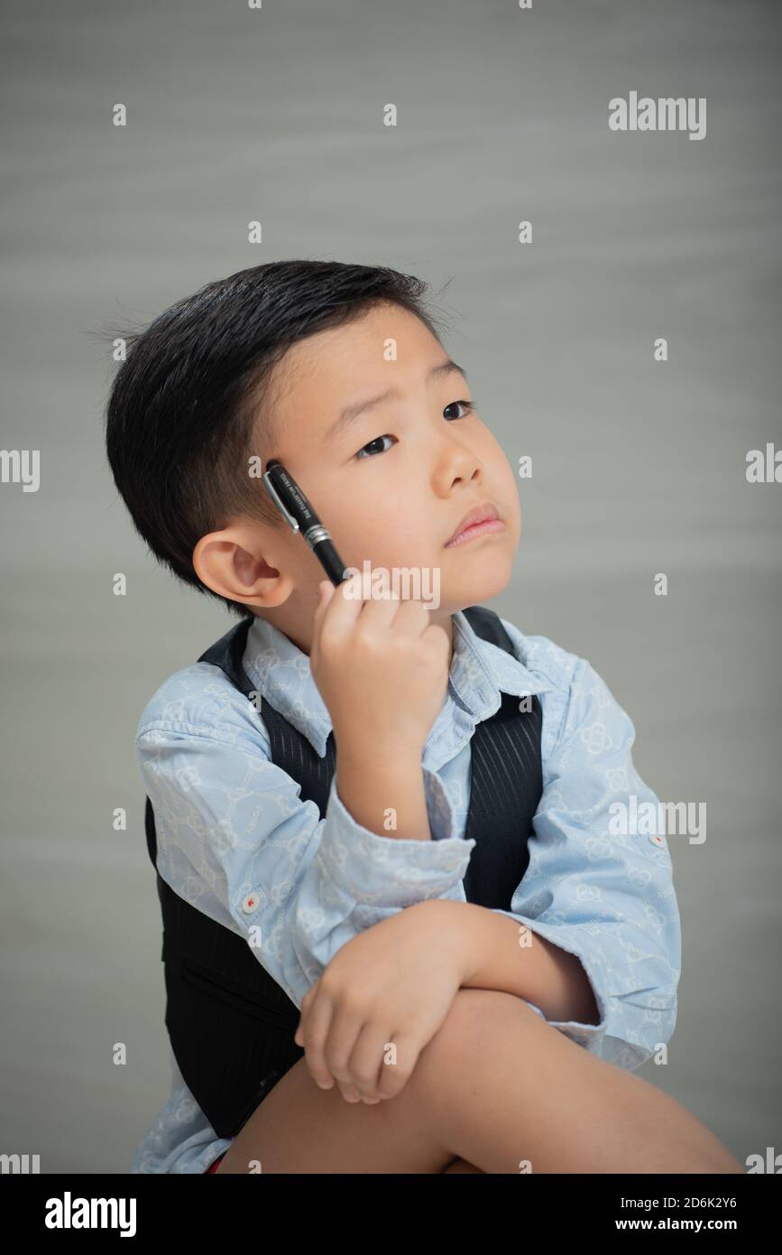 Asian child, looking smart and intellectual Stock Photo
