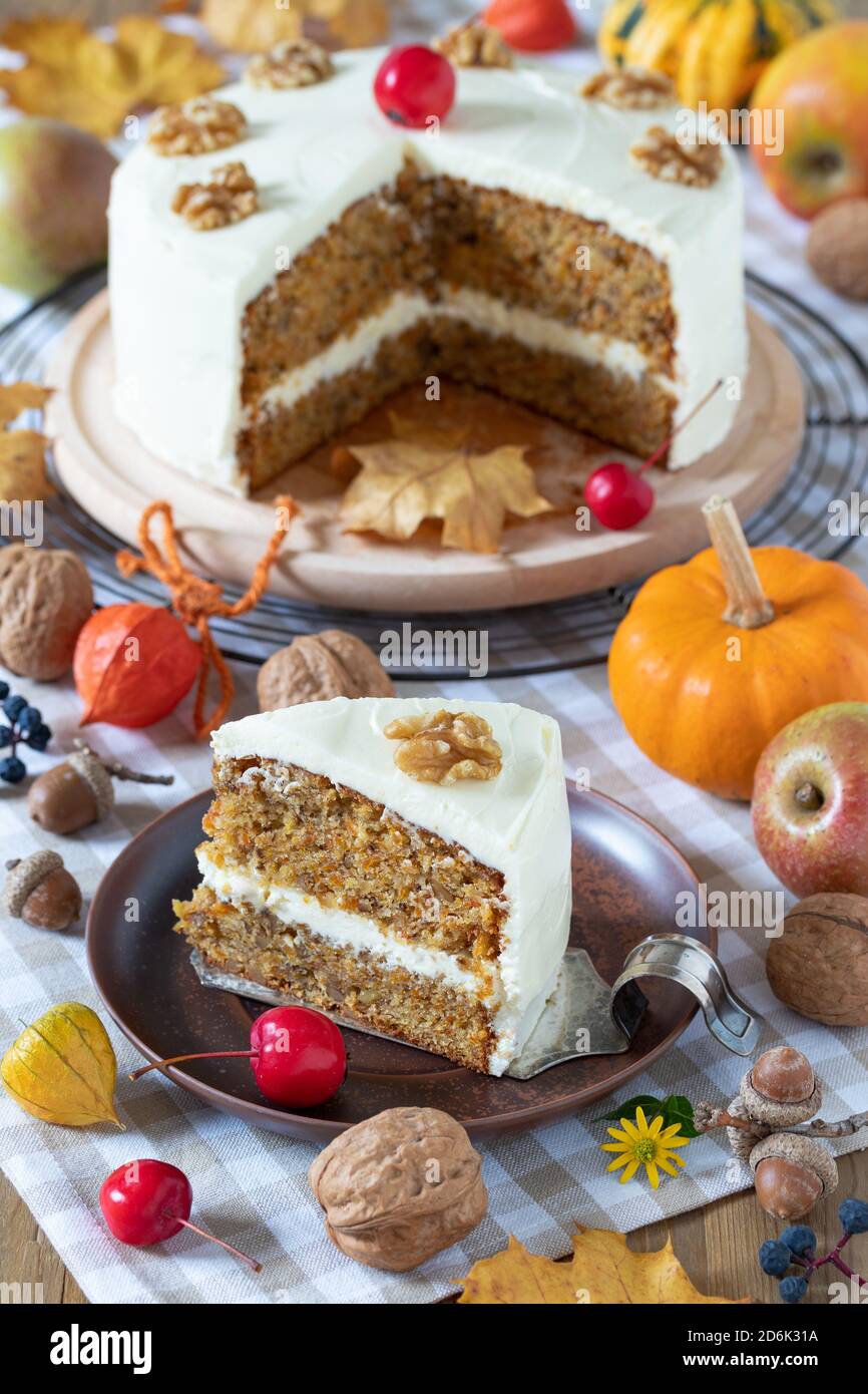 pumpkin apple cake with walnuts and cream cheese frosting Stock Photo