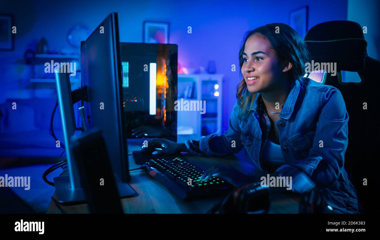 Happy Pretty Blonde Gamer Girl Playing Online Video Game on Her Personal  Computer Stock Photo - Alamy