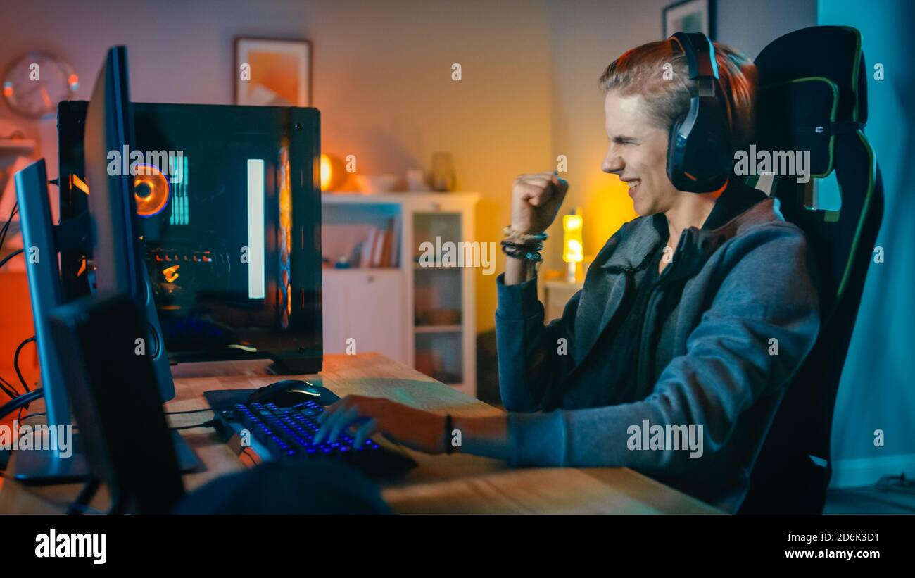 Free Photo  Player winning video games with controller and headset in  front of monitor. man using joystick and headphones, playing online games  on computer. person celebrating game win for leisure.