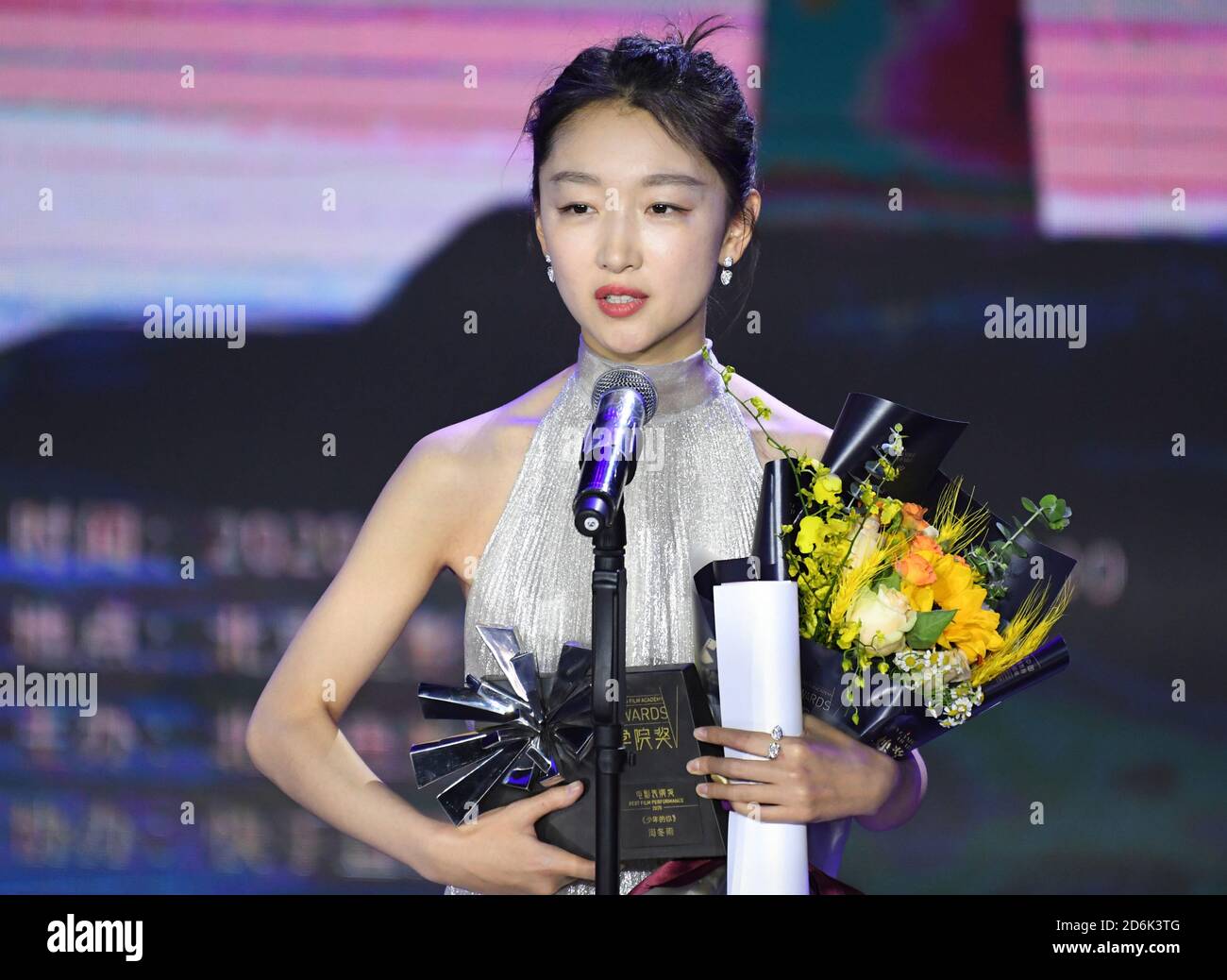 Chinese actress Zhou Dongyu and actor Huang Xuan attend the Chinese  Qualified TV Drama Awards Ceremony held by the Dragon TV in Shanghai,  China, 5 Mar Stock Photo - Alamy