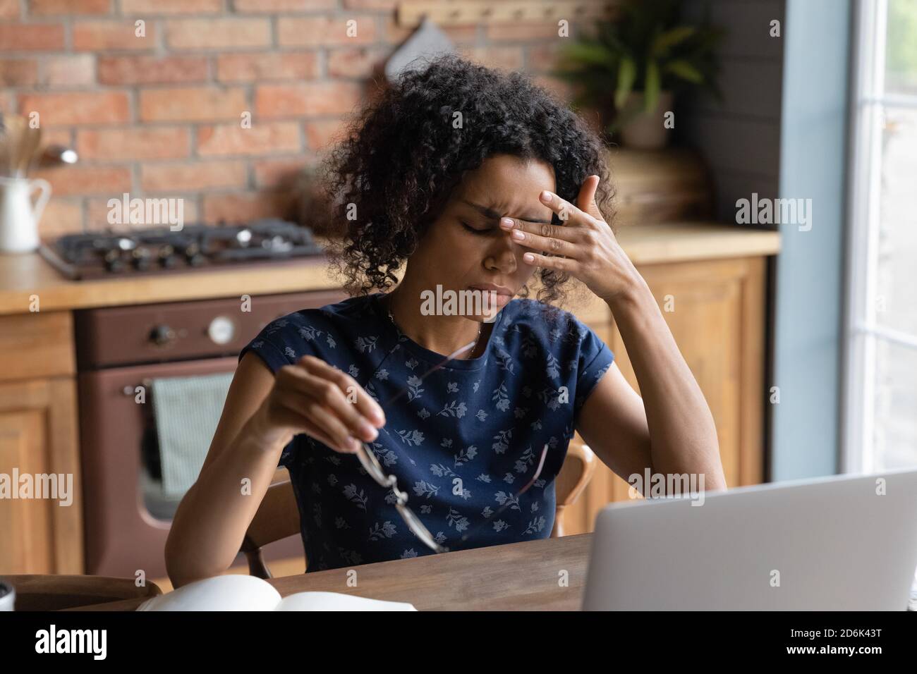 Tired african american woman working hi-res stock photography and ...