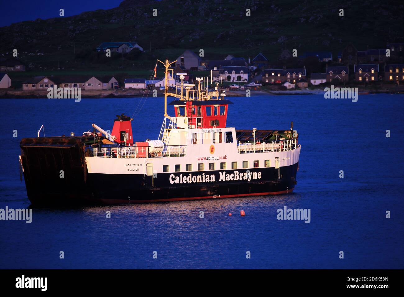 Calmac ferry Loch Tarbert caught in early morning light in the Sound of Iona, Inner Hebrides, Scotland Stock Photo