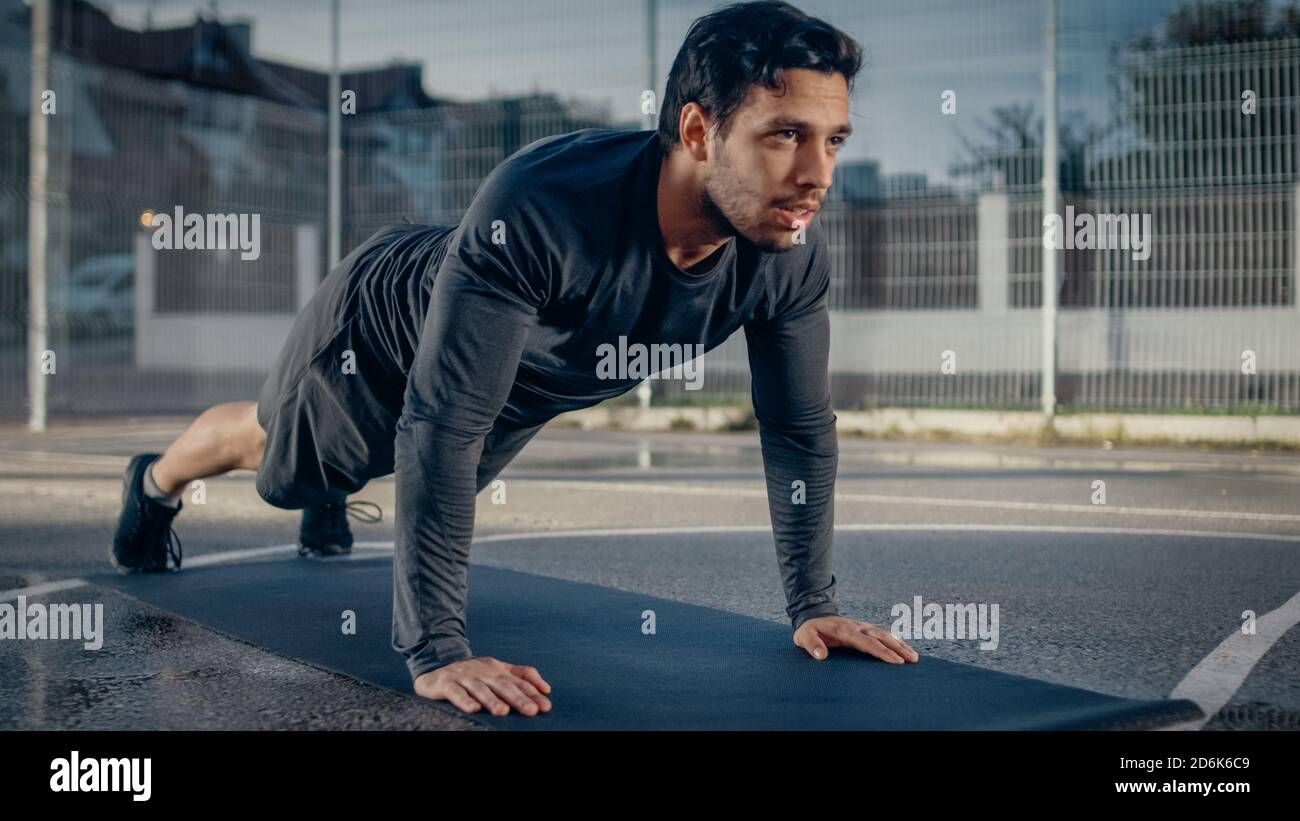 Strong Muscular Fit Young Man in Sport Outfit Doing Push Up Exercises ...