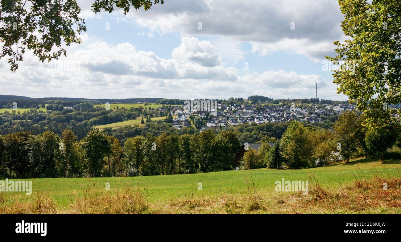 Panoramic view of Winterberg and the surrounding forests and hills on a sunny day in summer. Hochsauerland, North Rhine-Westphalia, Germany. Stock Photo