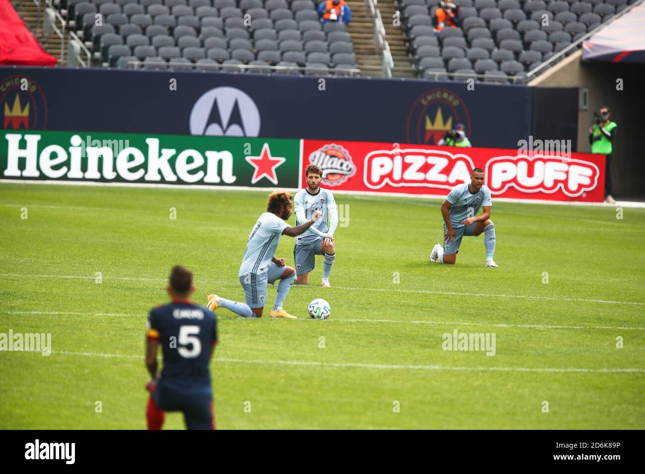Chicago, United States . 17th Oct, 2020. Sporting KC players kneel during a MLS match against the Chicago Fire FC at Solider Field, Saturday, Oct. 17, 2020, in Chicago, Illinois . The Fire tie Sporting KC 2-2 (IOS/ESPA-Images) Credit: European Sports Photo Agency/Alamy Live News Stock Photo
