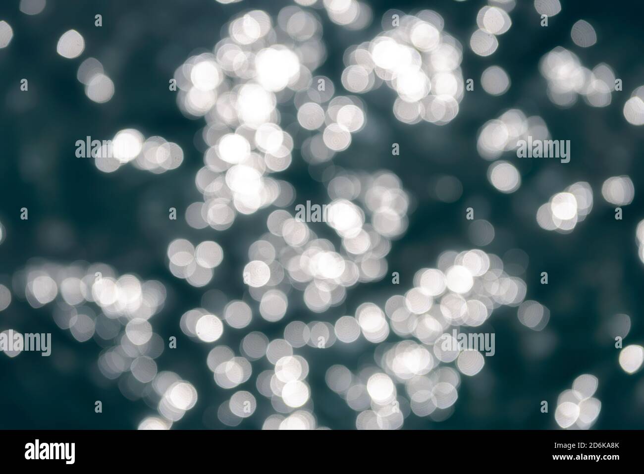 Colorful lights bokeh effect on the water. Abstract light bokeh ...