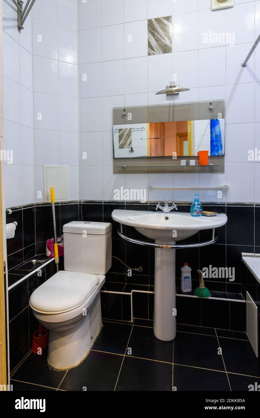 Classic bathroom interior in an apartment for daily rent, view of the