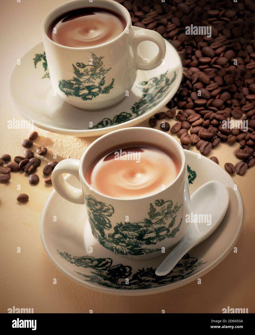 Traditional Chinese coffee and tea with coffee beans Stock Photo