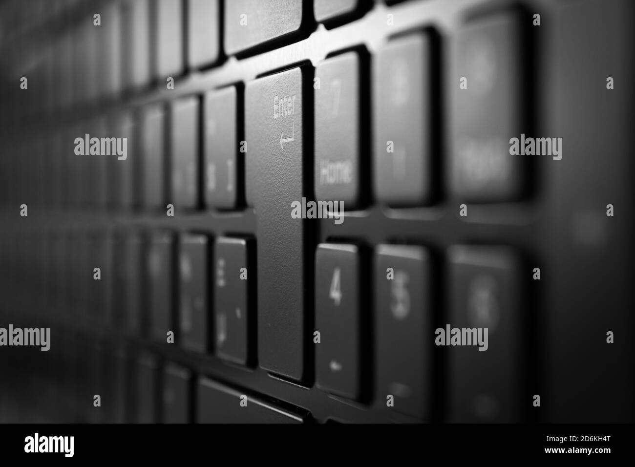Vertical view of laptop keyboard with selective focus and soft background blur Stock Photo