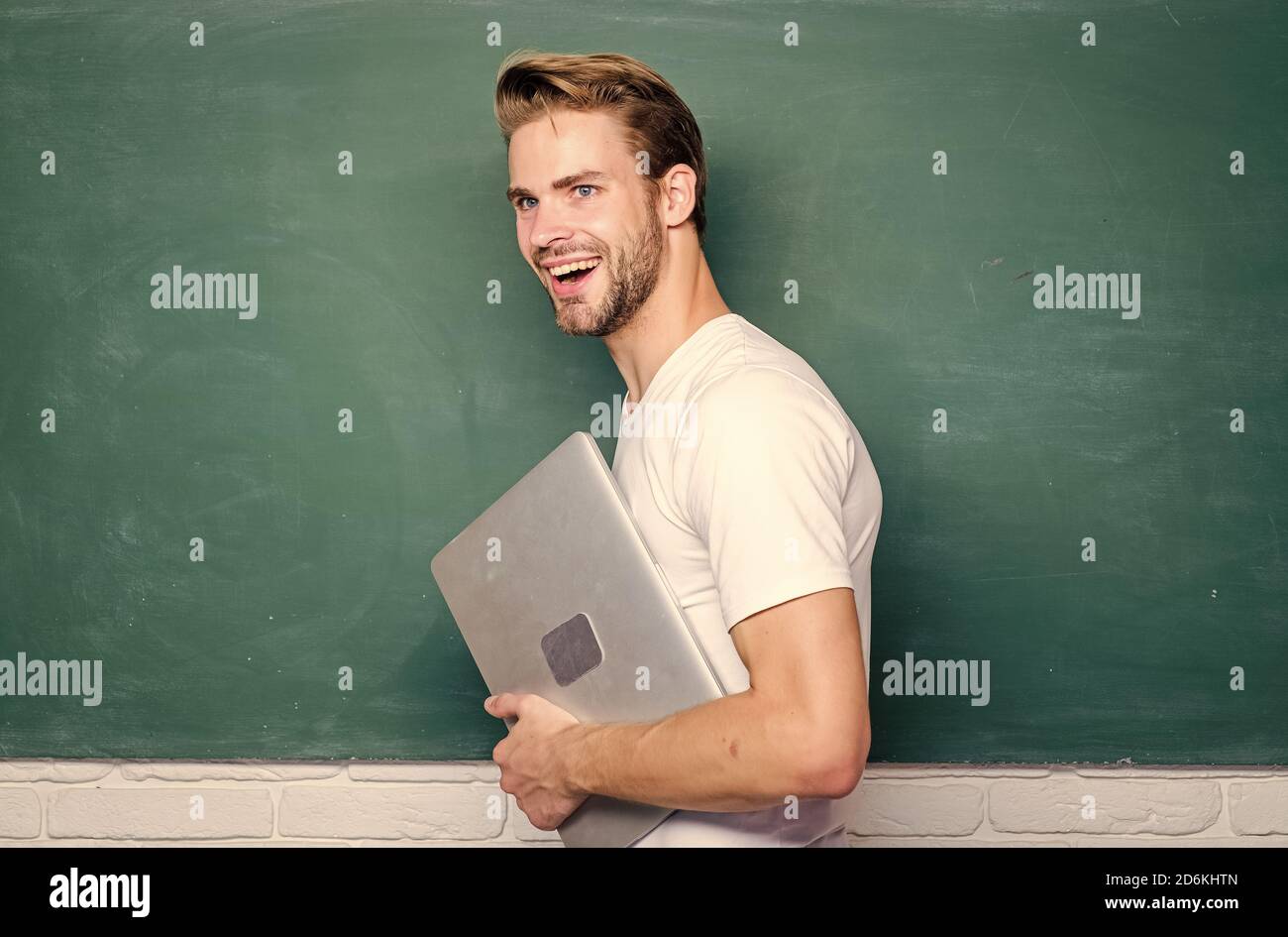 Security online life. Programming web development. Digital concept. Online communications. School teacher with laptop. Handsome man use modern technologies. Digital technology. Learn digital sciences. Stock Photo