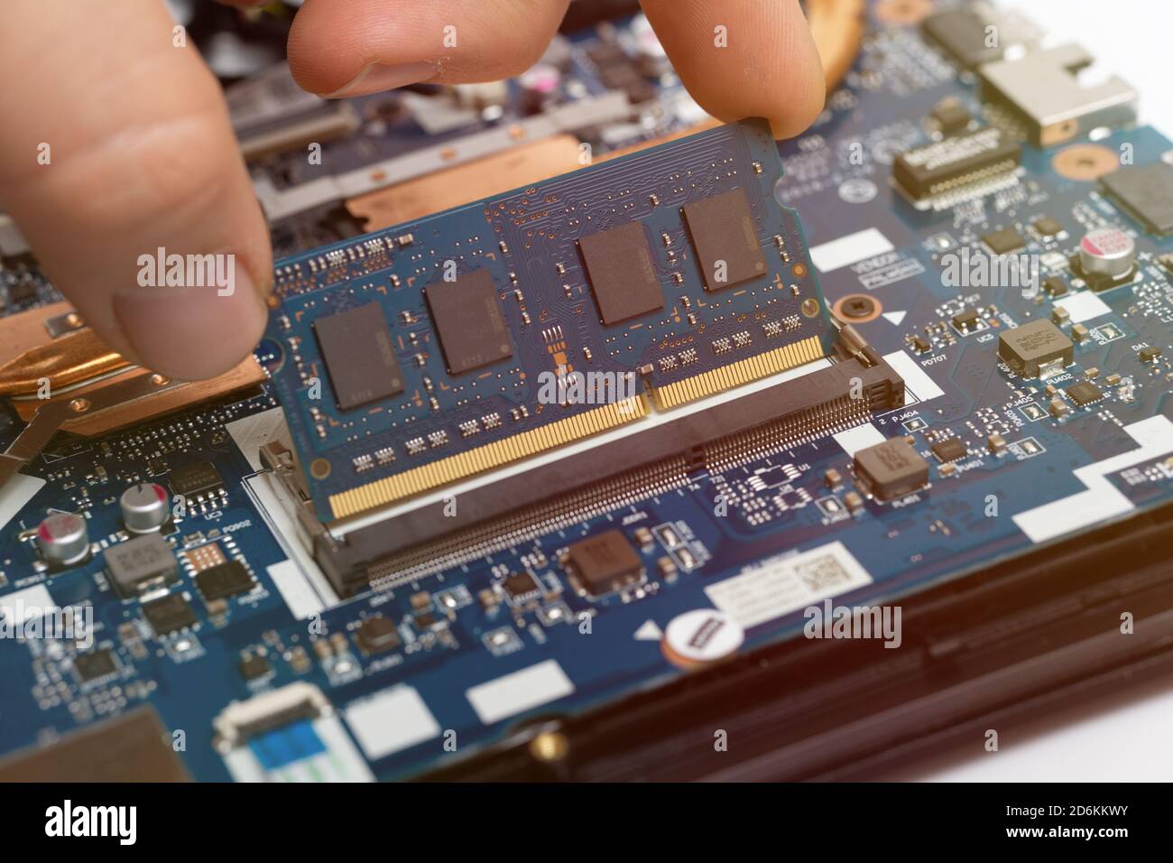 laptop ram memory replacement. improving computer performance. mainboard repair Stock Photo