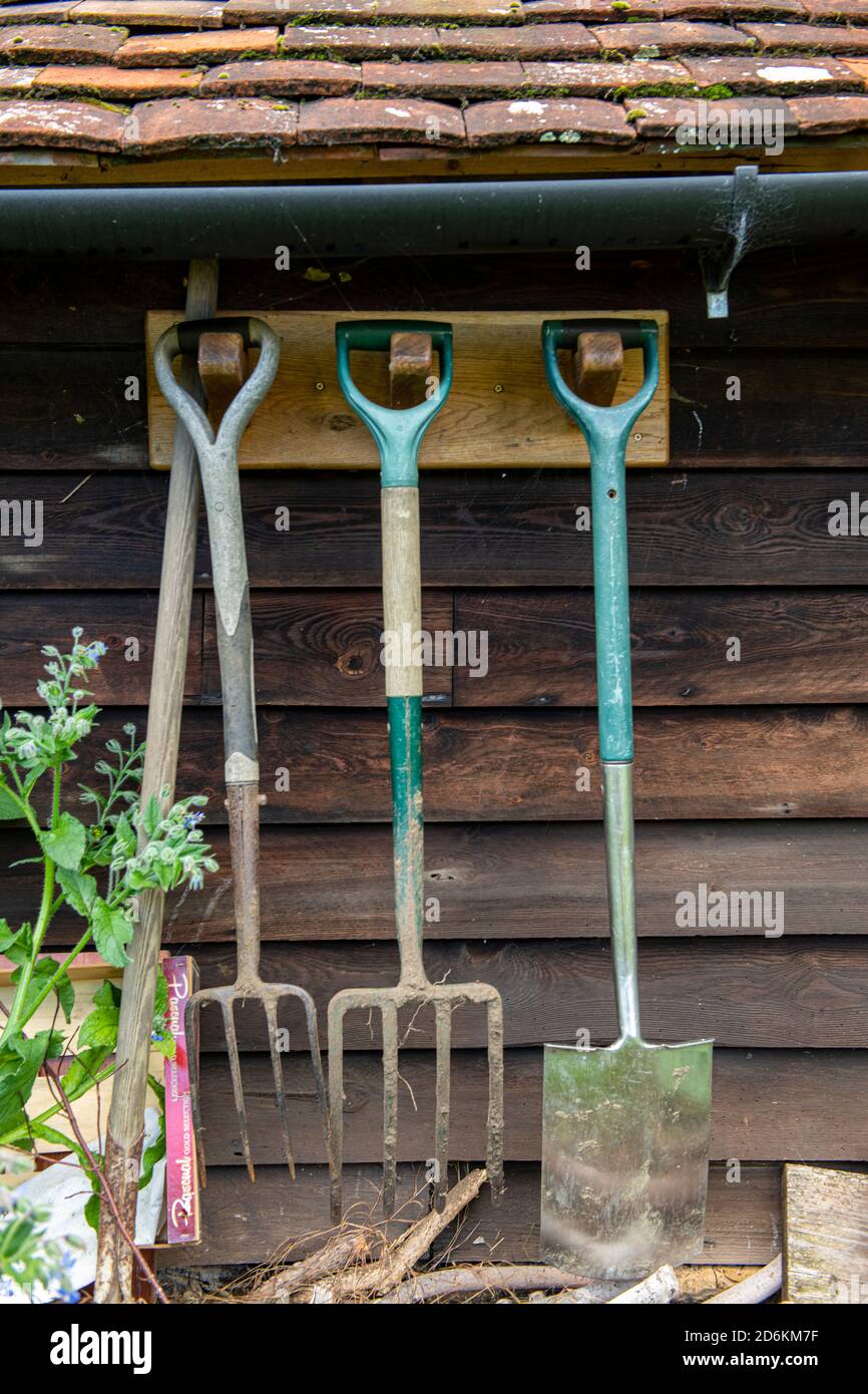 Hanging spade tools hi-res stock photography and images - Alamy