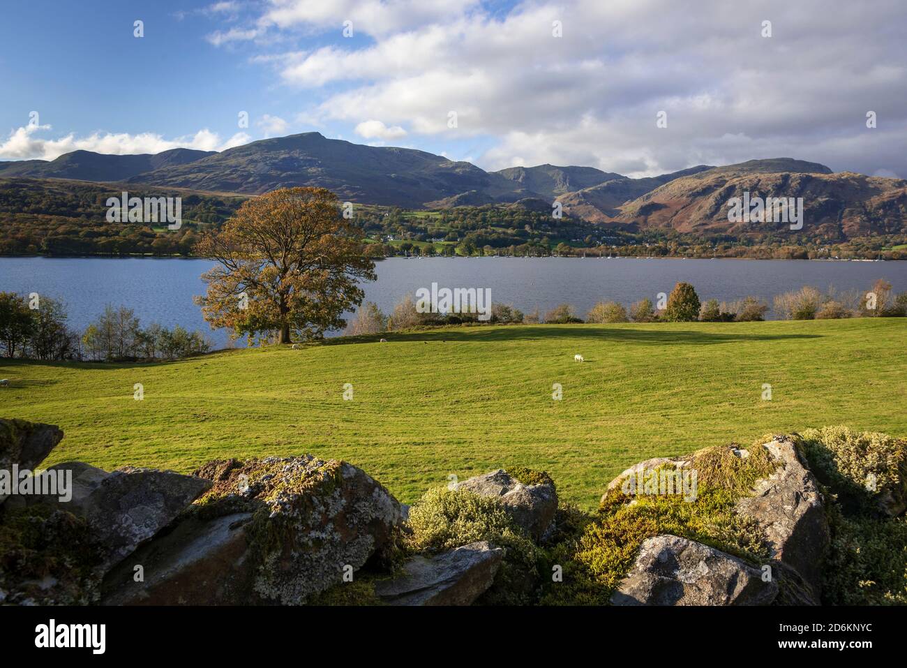 The Old Man of Coniston fell seen above the village and Coniston Water in the lake district. Stock Photo