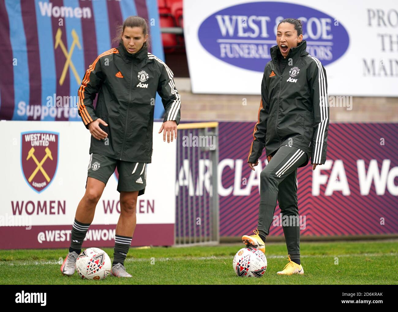 Manchester United's Tobin Heath (left) and Christen Press warm up prior to  the FA Women's Super League match at Victoria Road Stadium, London Stock  Photo - Alamy