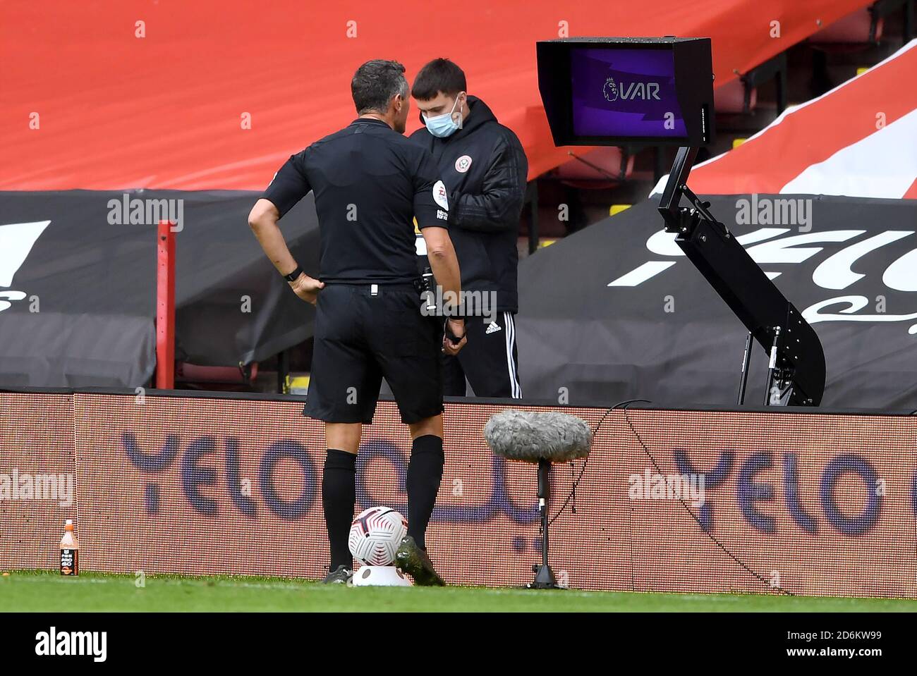 Referee Andre Marriner looks at the VAR before awarding Sheffield United a penalty during the Premier League match at Bramall Lane, Sheffield. Stock Photo