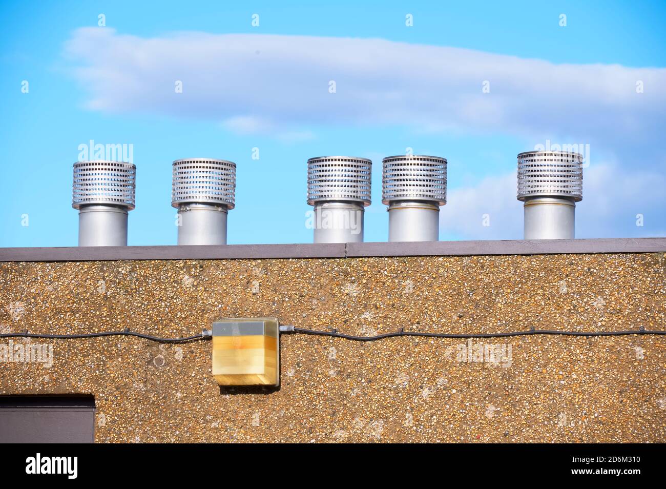 Flue chimney fixed to building exterior wall stainless steel from