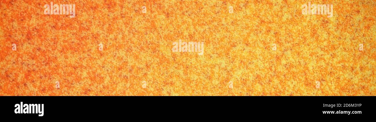Panorama background with abstract orange dotted fine texture. Stock Photo