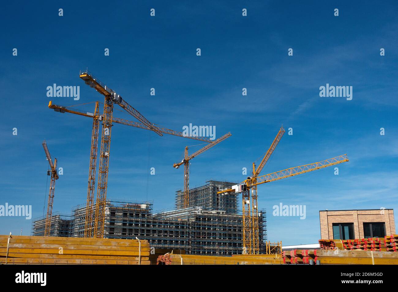 Construction site with tower crane for lifting building materials Stock ...