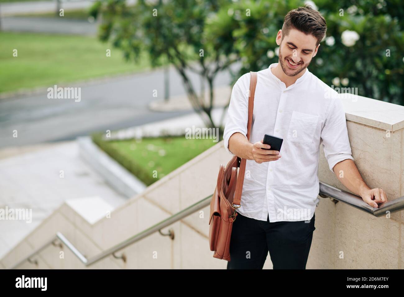 Man reading text message Stock Photo