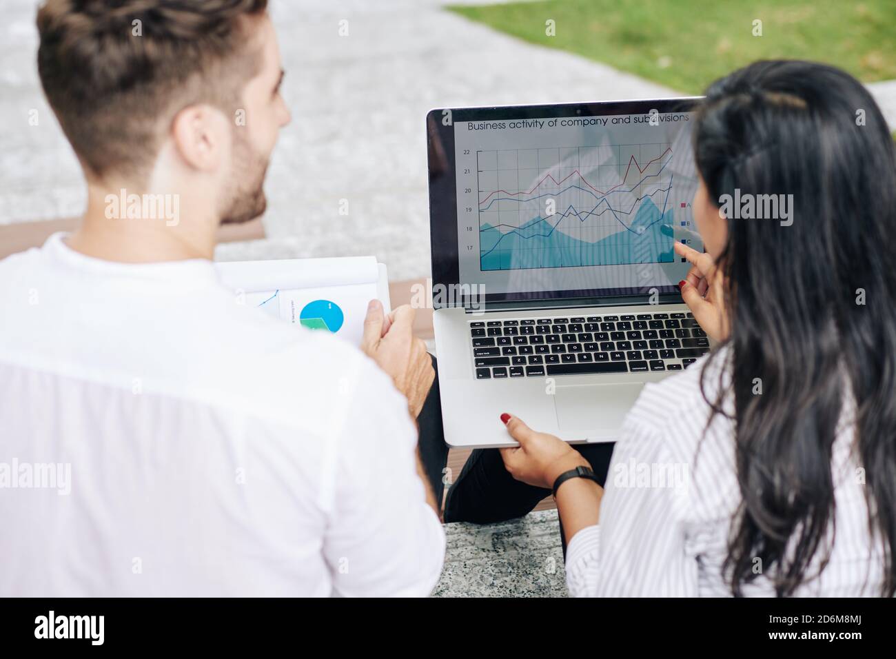 Entrepreneurs discussing report Stock Photo