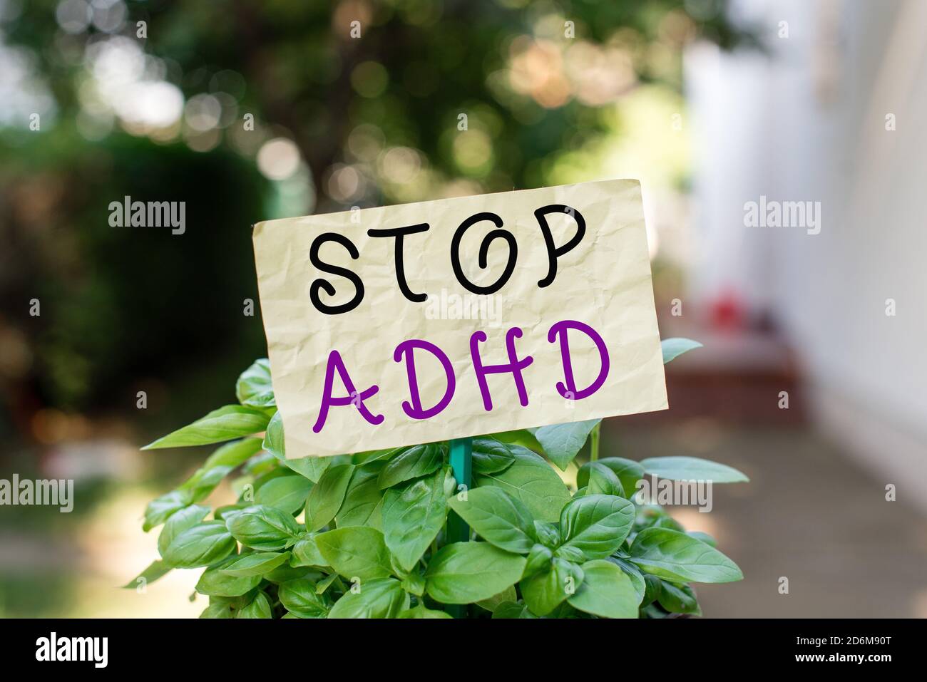 Word writing text Stop Adhd. Business photo showcasing treat a disorder that affects the brain and behaviors of a child Plain empty paper attached to Stock Photo