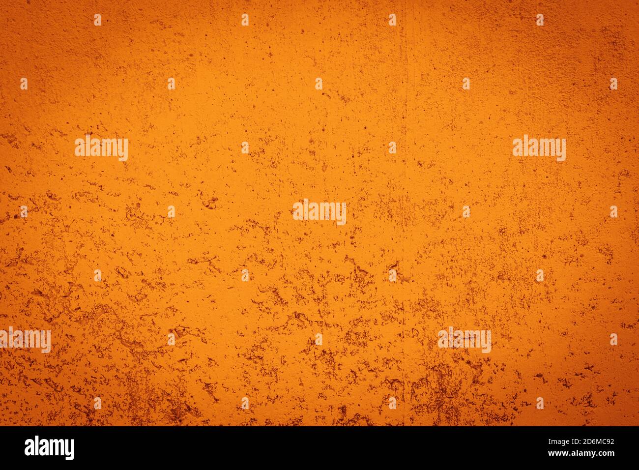 Grunge orange wall concreted wall for interiors texture background