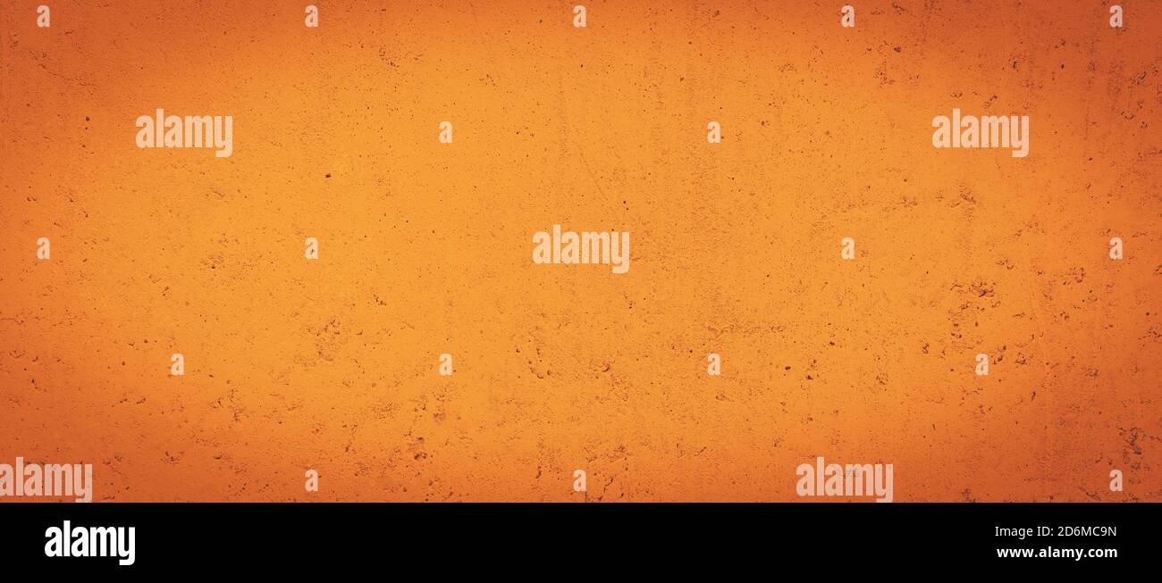 Grunge orange wall concreted wall for interiors texture background