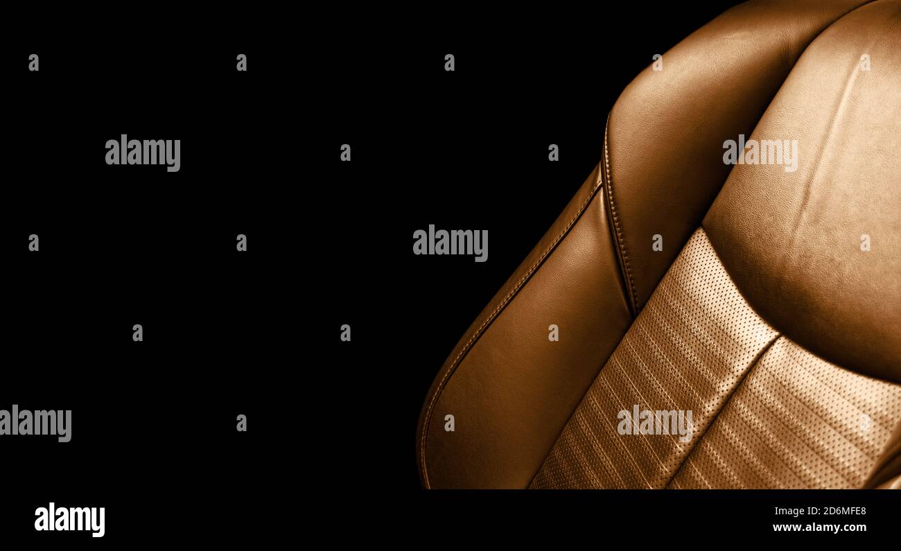 Modern Luxury car brown leather interior. Comfortable orange leather