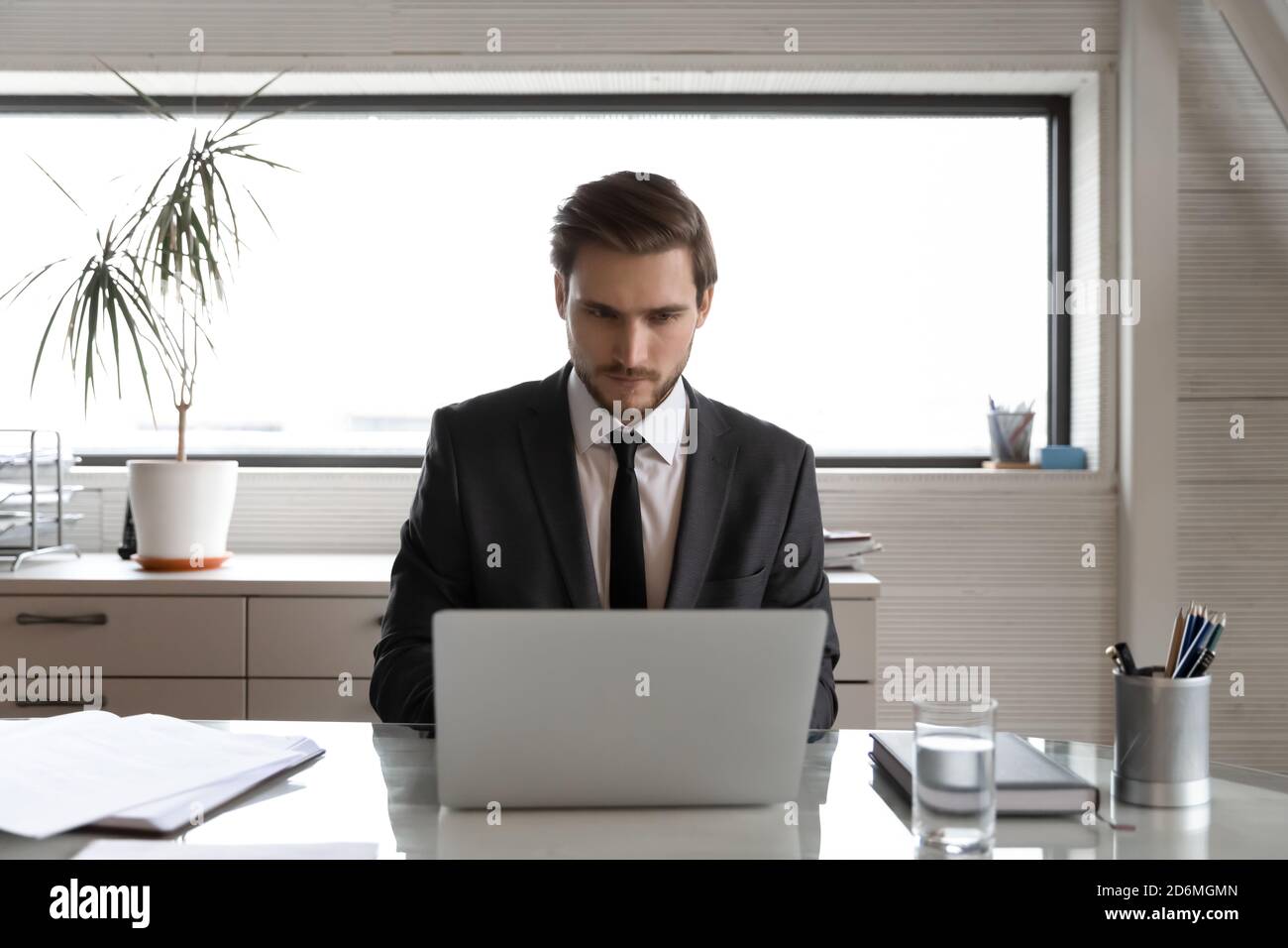 Online consultation young male manager hi-res stock photography and ...