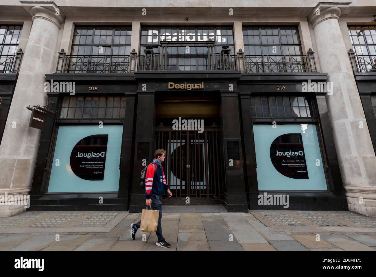 London, UK. 18 October 2020. The Desigual retail property stands empty on  Regent Street. The coronavirus pandemic has had a negative impact on  customer footfall resulting in several retail owners to permanently