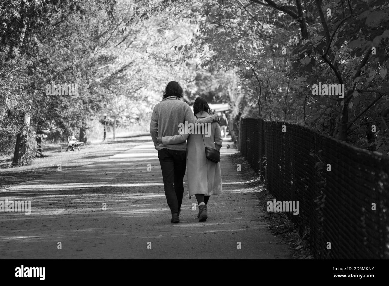 Young Couple Holding Hands Black And White
