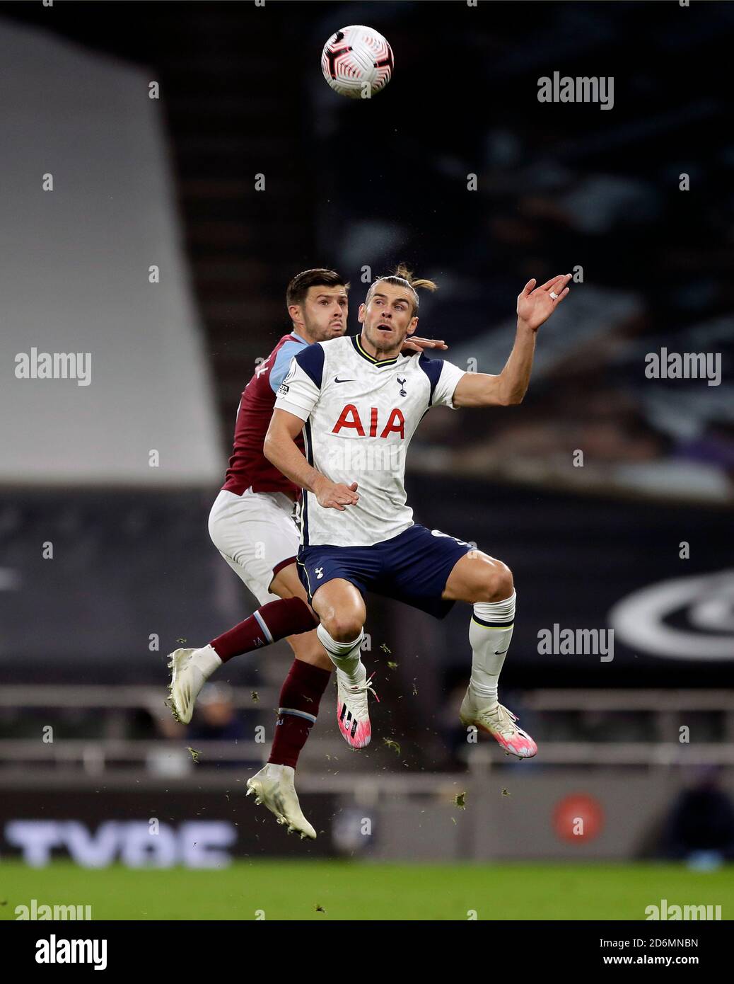 West Ham United's Aaron Cresswell (background) and Tottenham Hotspur's Gareth Bale battle for the ball in the air during the Premier League match at Tottenham Hotspur Stadium, London. Stock Photo