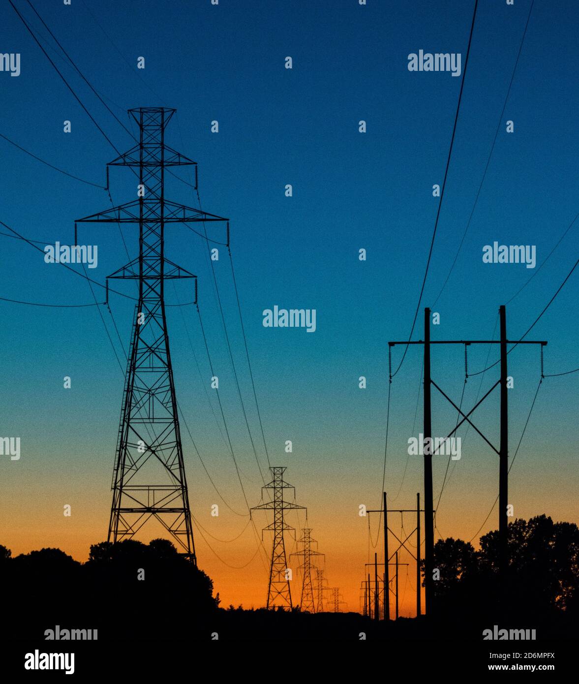 Hydro Lines shown with a sunset in the background Stock Photo Alamy