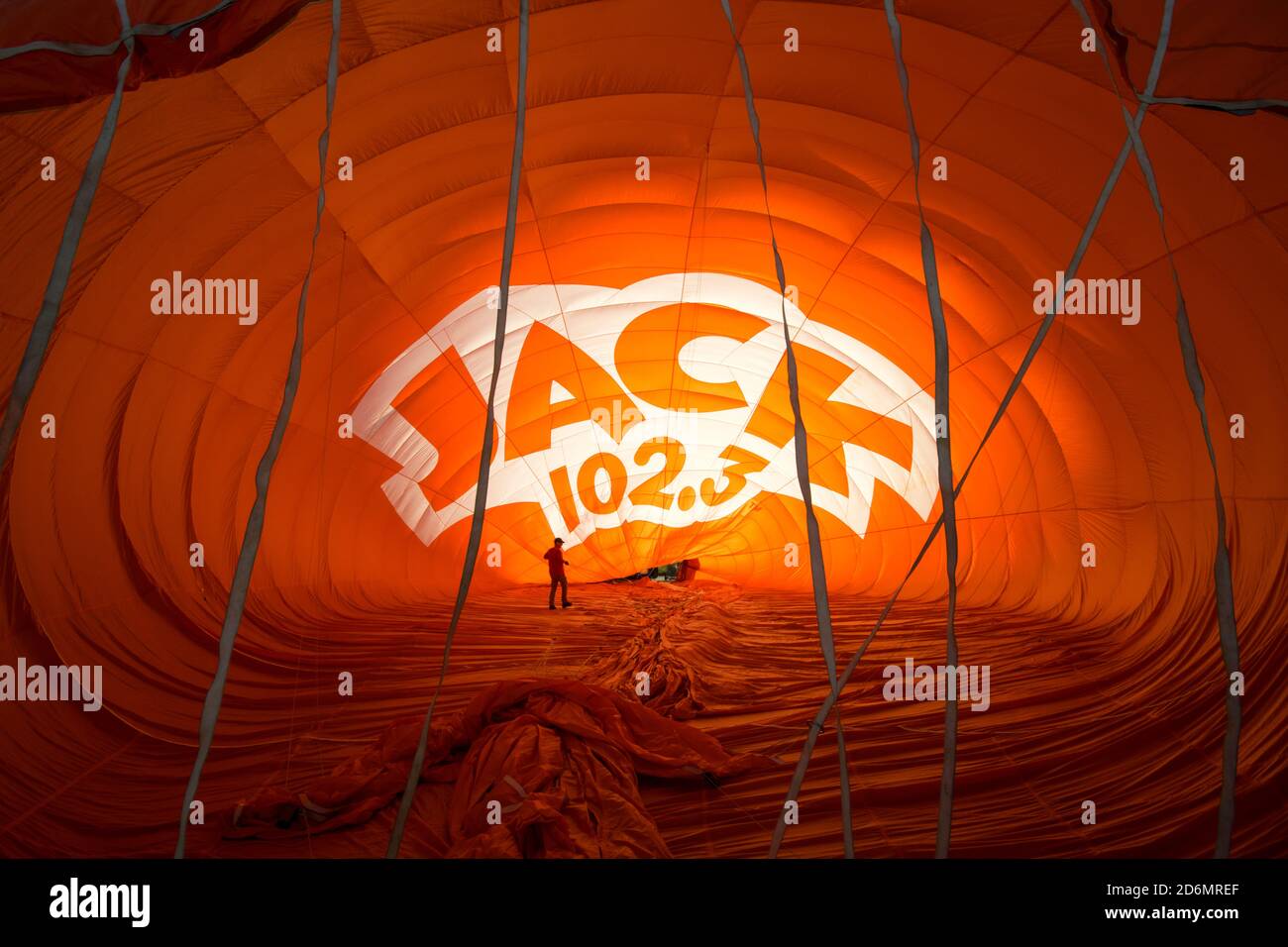 A hot air balloon in London Ontario being blown up with Jack 102.3 written on it Stock Photo