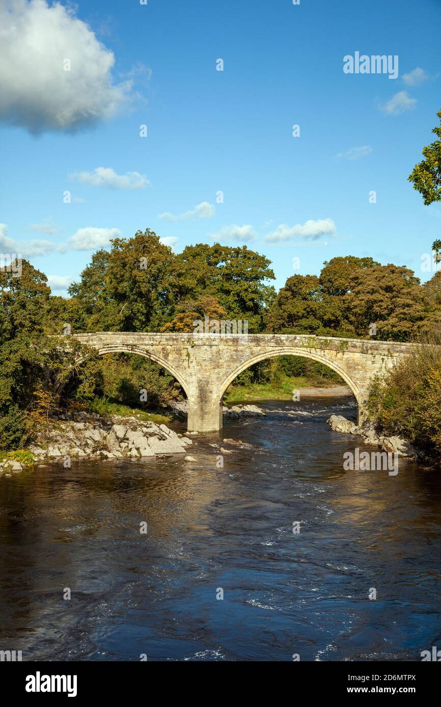 Medieval Devil’s Bridge over the River Lune at Kirkby Lonsdale in the Yorkshire dales national park England Stock Photo
