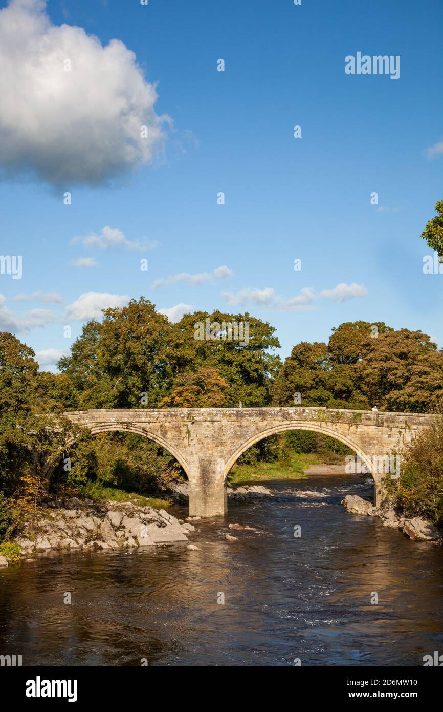 Medieval Devil’s Bridge over the River Lune at Kirkby Lonsdale in the Yorkshire dales national park England Stock Photo