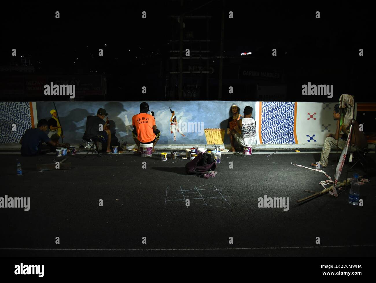 Guwahati, Assam, India. 18th Oct, 2020. Artist paint mural in a newly constructed fly over ahead