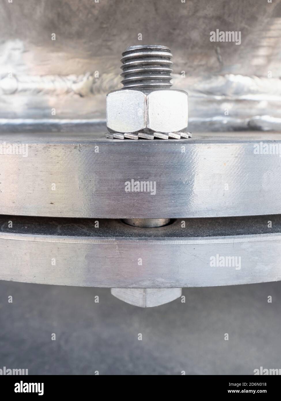 Silver stainless pipe flange with , srew, nut and washer. Tighten bolts