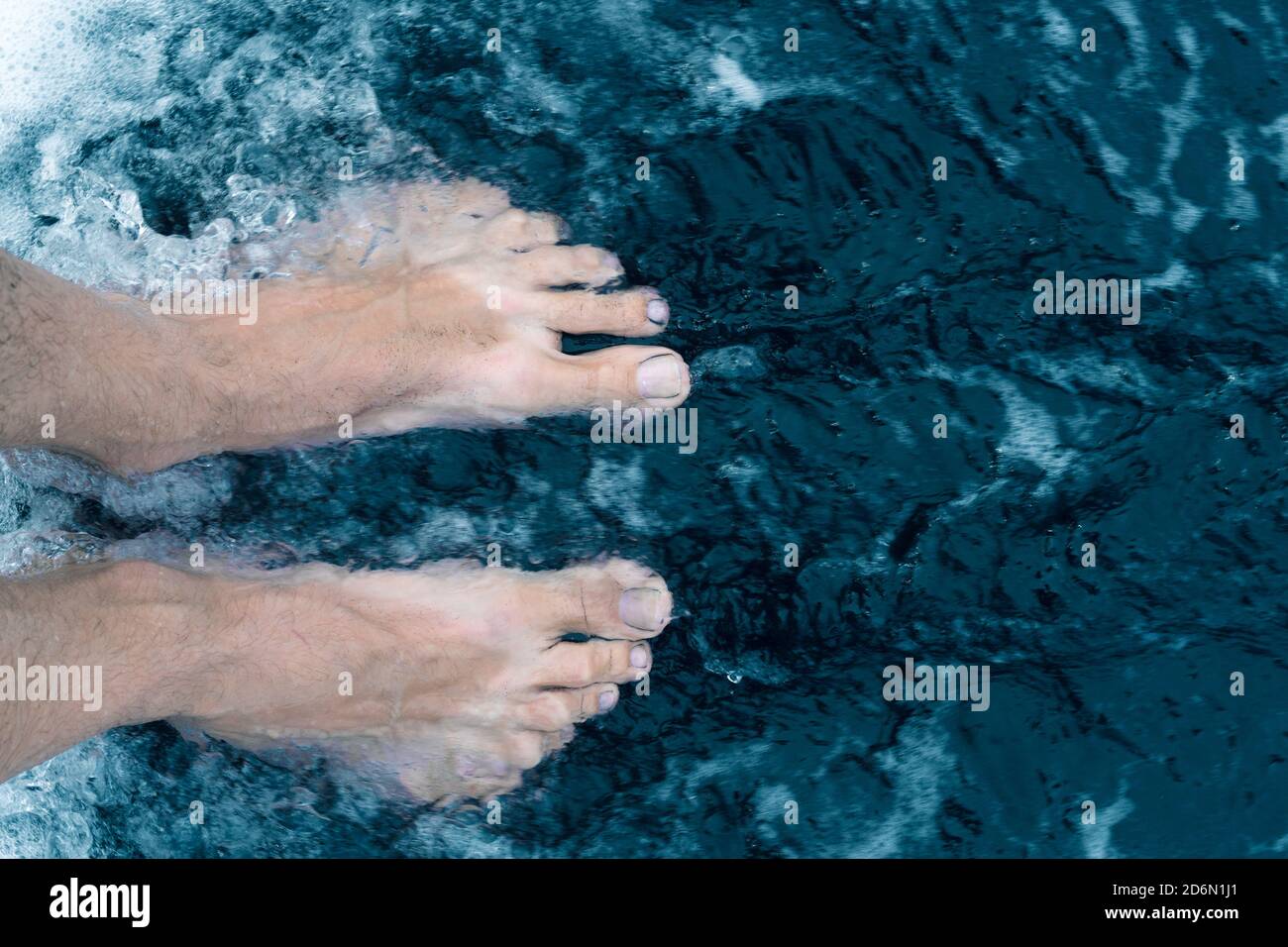Male feet walking on sand hi-res stock photography and images - Alamy