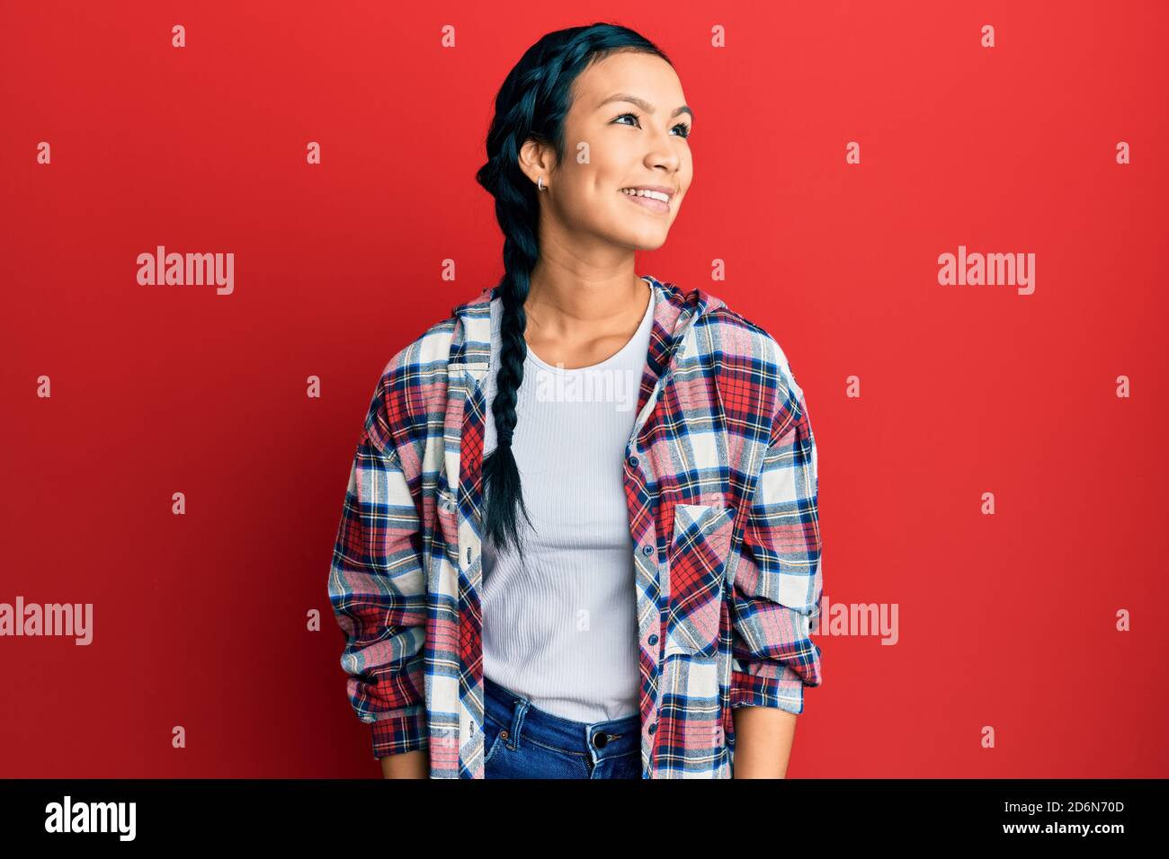 Hispanic Poses Beautiful hispanic woman wearing casual clothes looking to side, relax ...