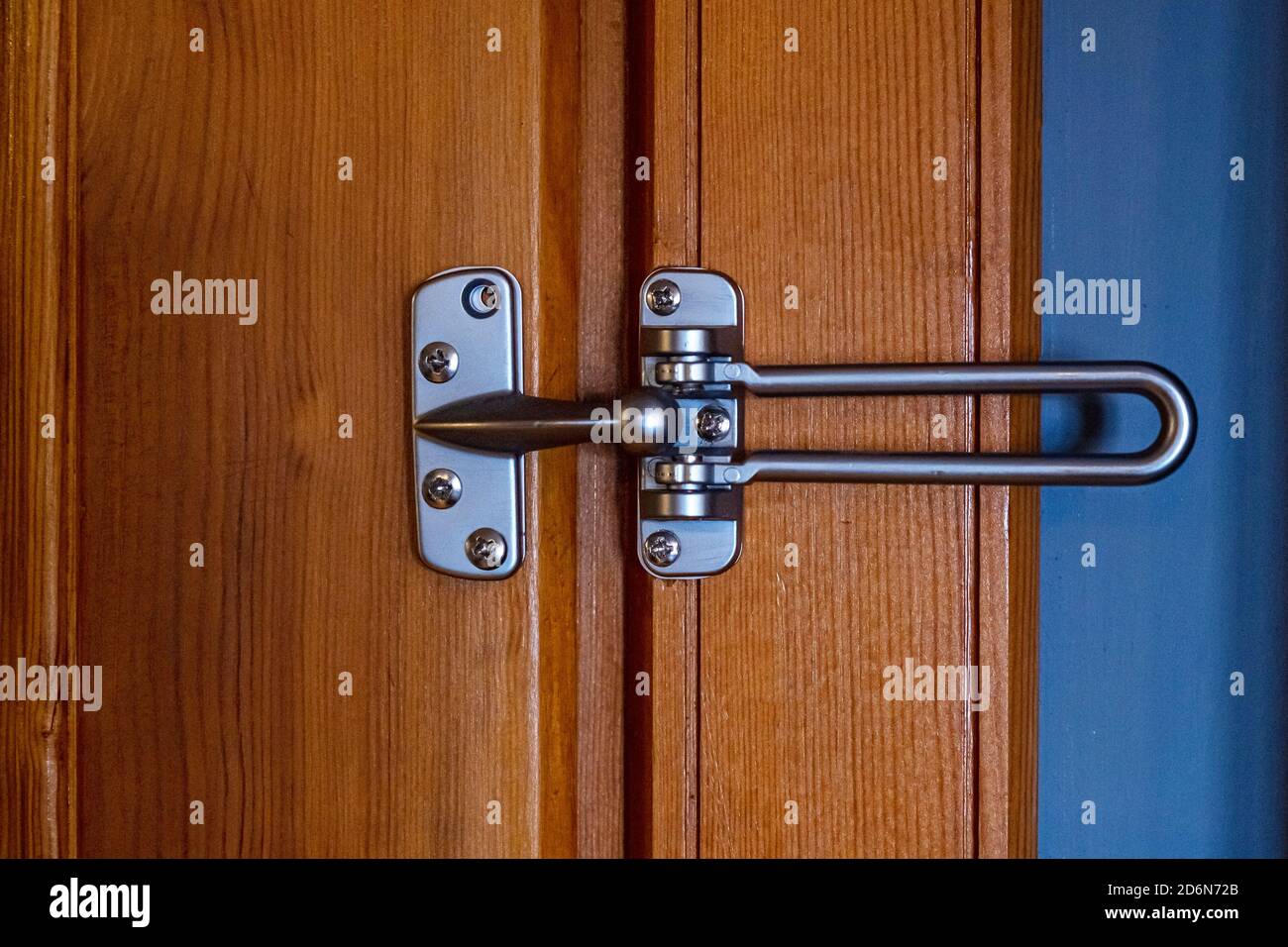 Close up wooden door with metallic lock Stock Photo - Alamy