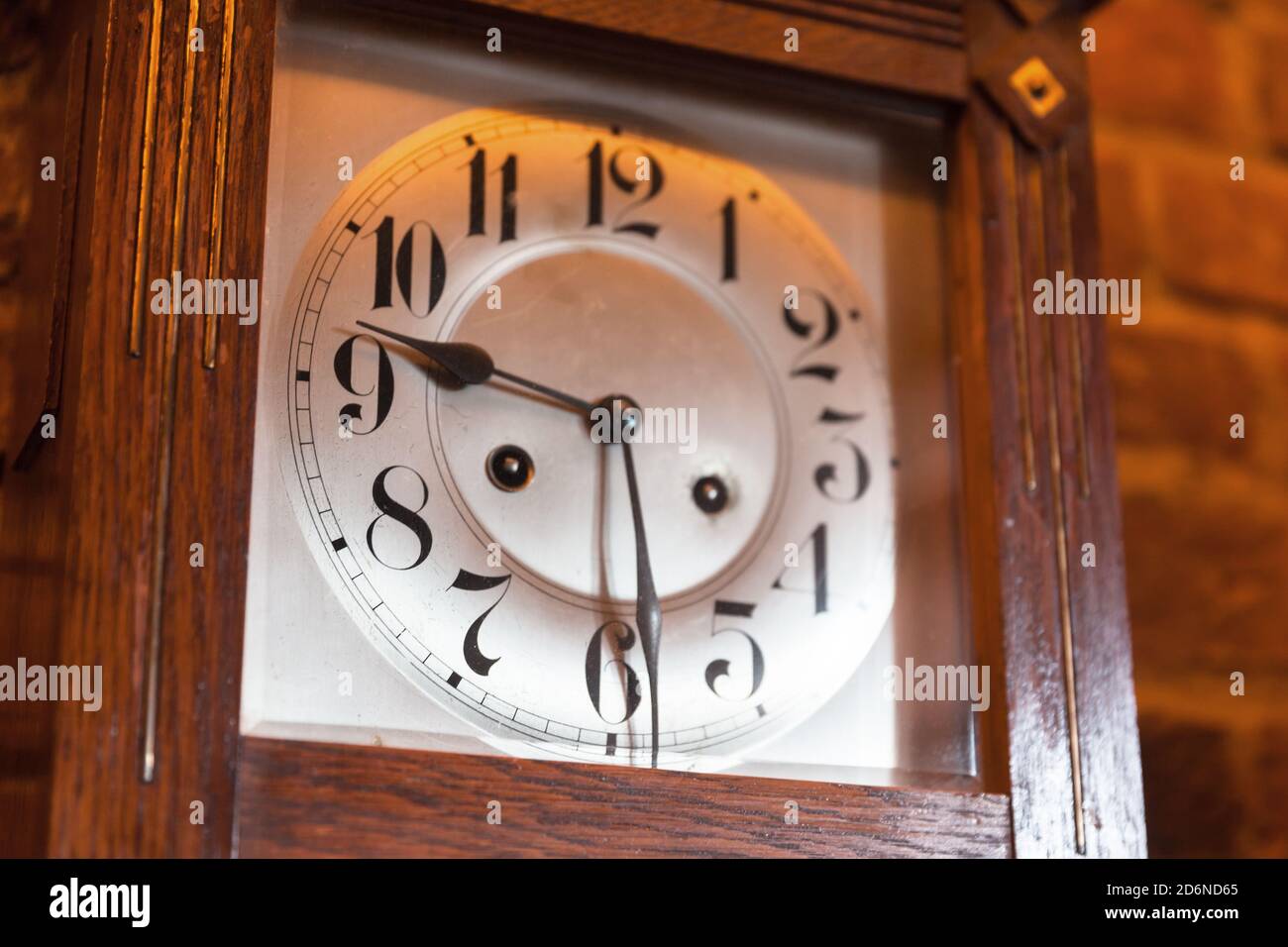 Vintage grandfather clock deal in wooden body. Close up photo Stock Photo