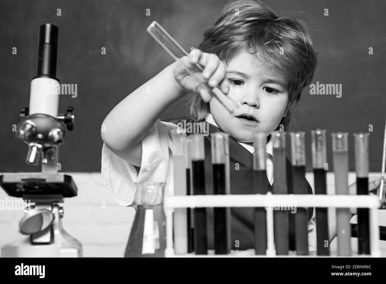 Chemistry science. September 1. Preschooler. Back to school. Science and education concept. Child from elementary school. What is taught in chemistry. Stock Photo