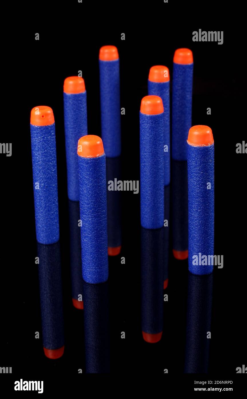 Toy gun bullets made from foam and rubber isolated on the black