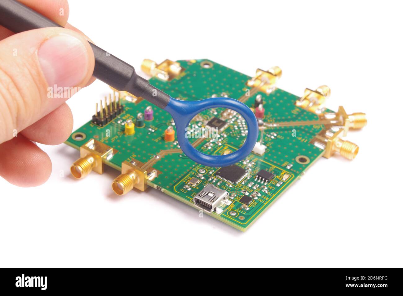 compatibility (EMC) engineer holding near