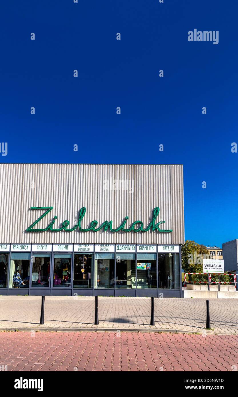 Exterior of Zieleniak neon sign on facade, market place for fresh  groceries, Ochota district, Warsaw, Poland Stock Photo - Alamy