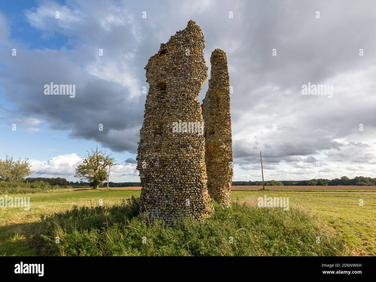 Remains of the 12th century round tower of the Church of St Mary, Thorpe Parva, near Diss, South Norfolk, England, UK. The church demolished in 1540. Stock Photo