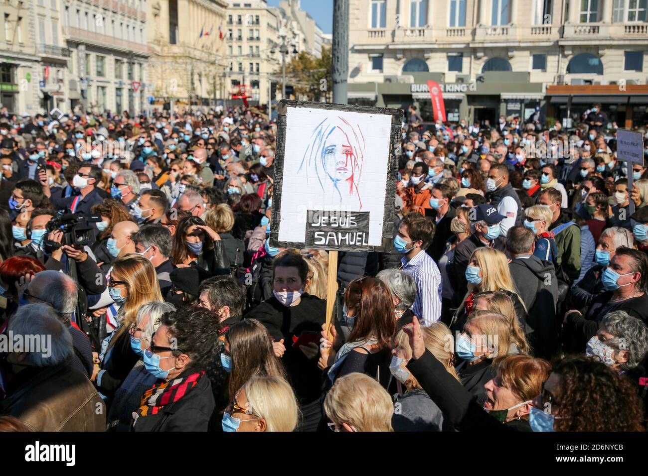 Thousands of protesters wearing face masks gather at Place de la ...