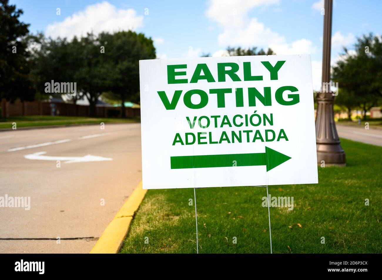 A sign directs residents to an early voting polling location for the 2020 Presidential election. Stock Photo